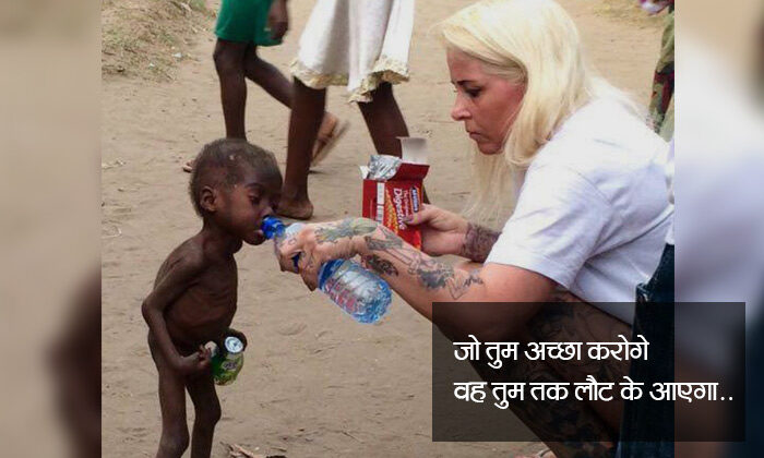 foreigner lady offers water to a poor child